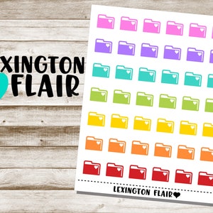 May include: A sheet of colorful folder stickers with a heart design. The stickers are in a rainbow of colors, including pink, purple, blue, green, yellow, orange, and red. The stickers are arranged in rows and columns on a white background. The text "LEXINGTON FLAIR" is printed at the bottom of the sheet.
