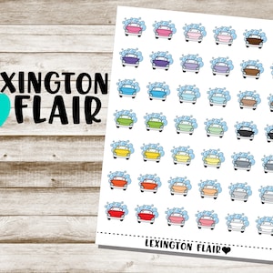 May include: A sheet of car wash stickers with a variety of colors, including red, orange, yellow, green, blue, purple, pink, brown, gray, and black. The cars are all in a cartoon style and have soap bubbles around them. The sheet is labeled "LEXINGTON FLAIR".