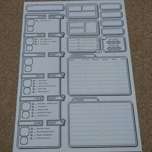 May include: A black and white character sheet for a tabletop role-playing game. The sheet includes sections for character name, stats, skills, saving throws, attacks, features, and traits.