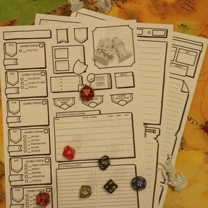 May include: A stack of white character sheets for a tabletop role-playing game, with printed sections for stats and skills. Several multi-sided dice in red, green, black, and blue are scattered across the sheets, along with miniature figurines.