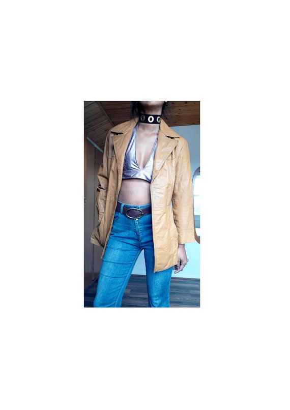 70's vintage real leather in a camel colour with d