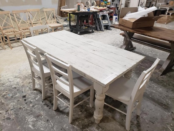 Farmhouse table with white chairs deals