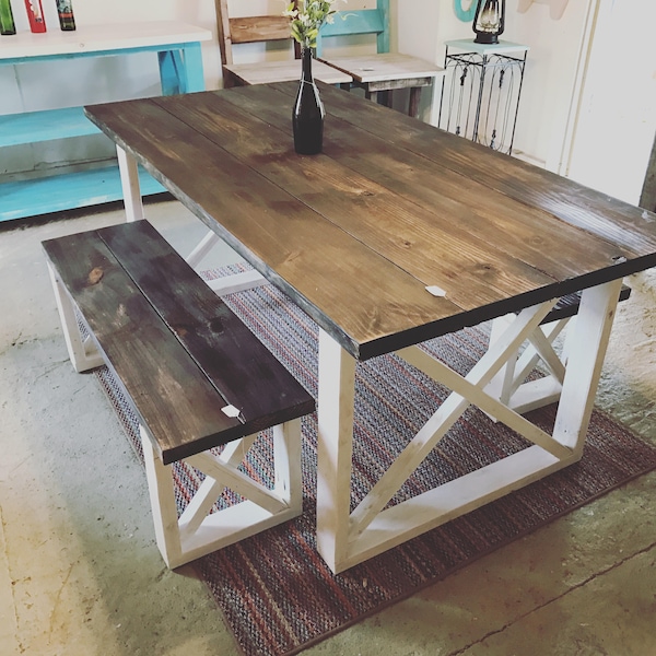 Rustic Farmhouse Table With Benches with Dark Walnut Top and Weathered White Base and Cross Brace Design.