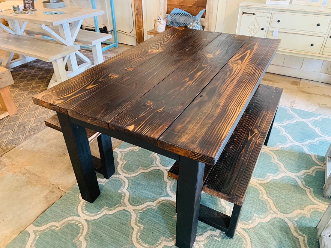 Table with black legs and wood top deals