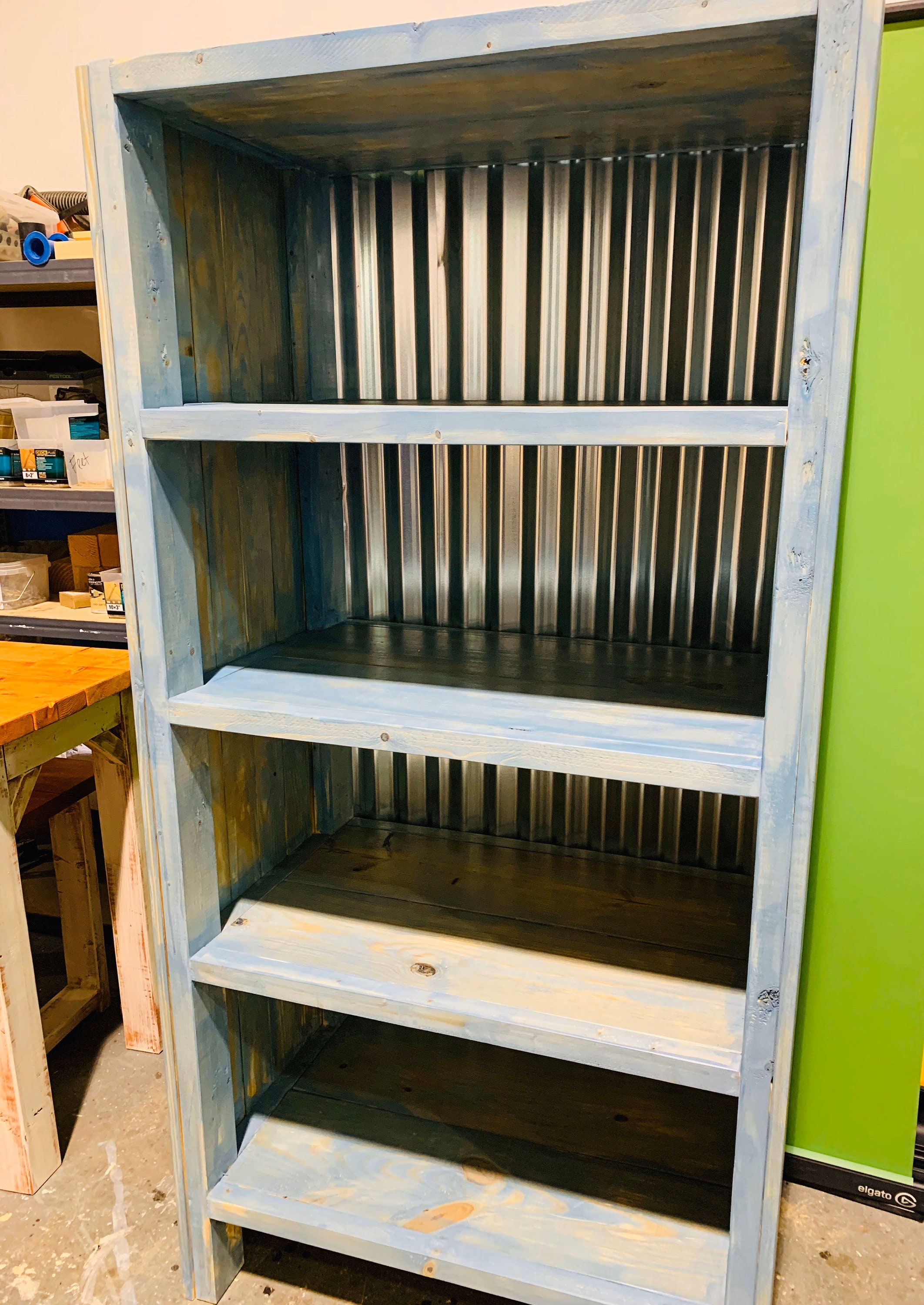 Rustic Farmhouse Style Bookshelf With A Distressed Aqua Milk Paint