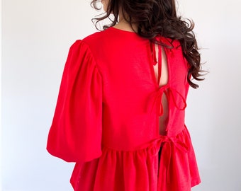 Womens Tie Back Ruffle Peplum Top