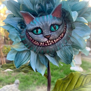 Alice in Wonderland (non) Talking flowers "Cheshire Cat in Blue"  by Sutherland For party props  tea parties table decor vignettes