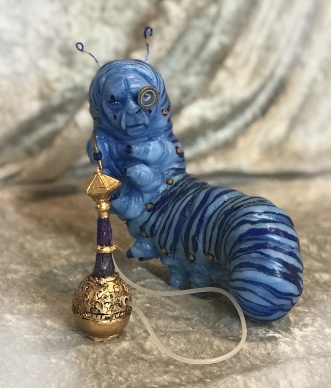 alice in wonderland caterpillar statue