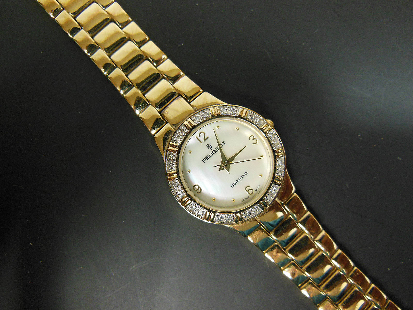 Peugeot diamond online watch