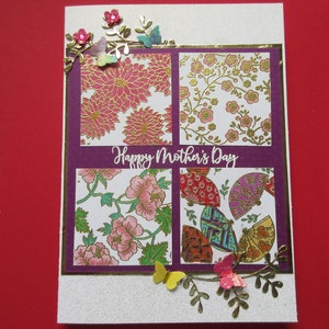 Carte fantaisie pour la fête des mères, faite main, unique en son genre. Avec de belles fleurs, des éventails et des papillons, garnis d'or. « Bonne fête des mères ».