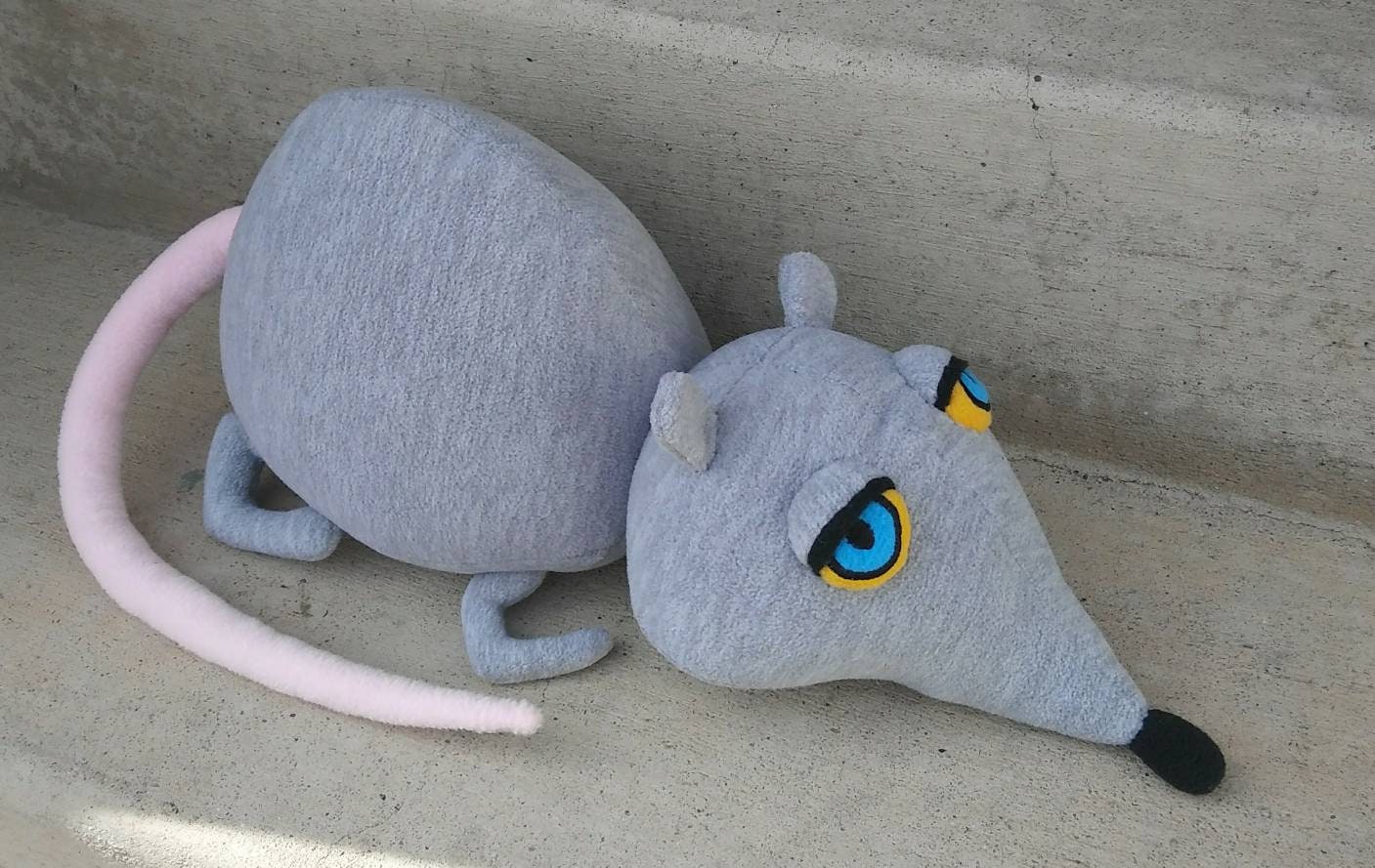 large stuffed rat