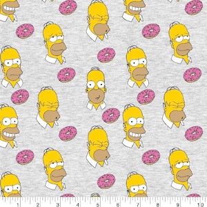 May include: A gray fabric with a repeating pattern of yellow cartoon characters with pink donuts. The characters have yellow skin, black eyes, and black hair. The donuts are pink with white sprinkles.