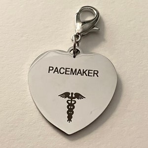 Medic Alert Stainless Steel Heart shaped token, clip on keys or phone or body or anywhere to indicate medical caution in rescue situations.