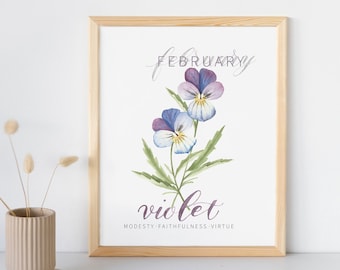 May include: A printable art print with a watercolor illustration of a violet flower. The print features the text "February" and "violet" with the words "modesty, faithfulness, virtue" below the flower.