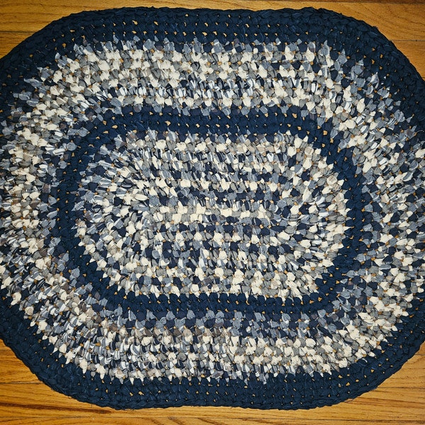 Handmade crocheted rag rug in dark blue, denim and white 33"x25"