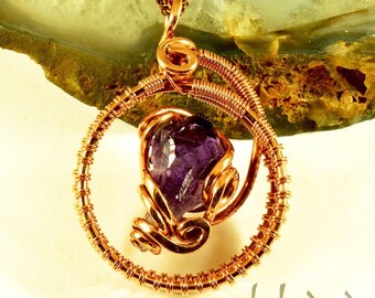 Colgante artesanal de punta de amatista envuelto en alambre de cobre - Joyería Infinity hecha a mano