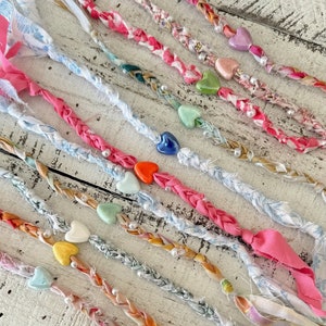 Pulseras de corazón trenzado