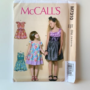 UNCUT McCall&#39;s 7310/ M7310 Sewing Pattern. Girls&#39; Dresses with Gathered Skirt, Hemline Variations, and Zipper Back. Fancy Girls&#39; Dresses.
