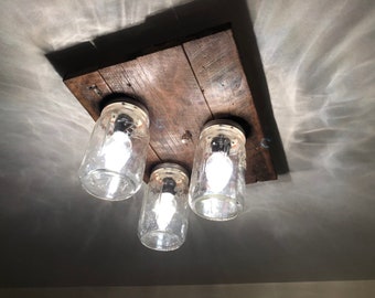 Rustic barnwood Mason jar hallway light.