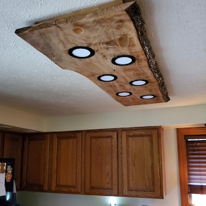 The MITCH recessed LED live edge wood chandelier