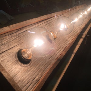 The BUFFALO CREEK barn wood bathroom vanity 8 bulb strip