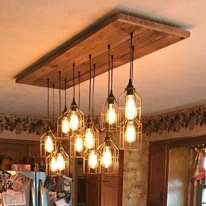 The GRIZZLY BEAR CHANDELIER rustic barn wood industrial cage chandelier