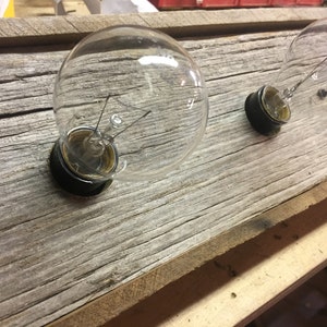 The BUFFALO CREEK 4 bulb barnwood Rustic vanity light image 3