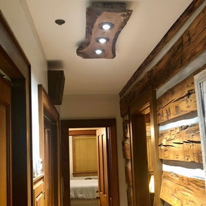 The HIGH AND TIGHT recessed light live edge timber chandelier