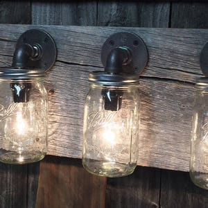 The Jarhead pipe fitting Mason Jar barnwood Bathroom Vanity bar or wall lighting