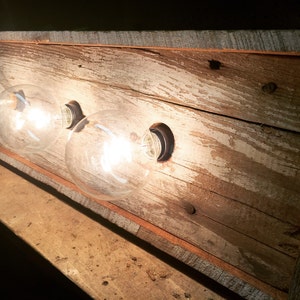 The BUFFALO CREEK 4 bulb barnwood Rustic vanity light image 4