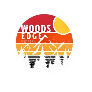 May include: A retro-style logo for Woods Edge Company, featuring a sunset with mountains and trees in front of it. The text "Woods Edge Company" is in white letters on a red, orange, and yellow background.