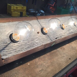 The BUFFALO CREEK 4 bulb barnwood Rustic vanity light image 6