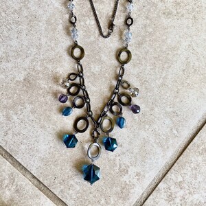 Repurposed Long necklace with teal and purple drop beads