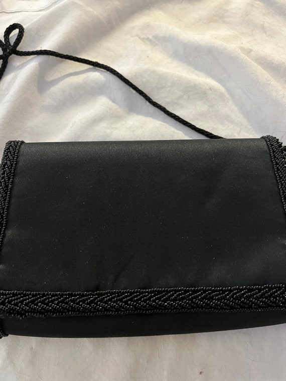 Courrèges Mini Loop Satin Crossbody Bag in Dark Lilac