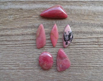 Par av rhodonitcabochoner, matchade par, cabochoner av rosa ädelsten