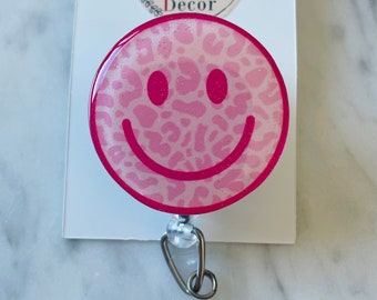 Pink Leopard Print Happy Face ID Badge Reel. Pink Happy Face ID Badge Reel