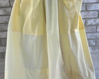 Pioneer, trek, theatre, plays, colonial, prairie, historical events, reenactments. Floral tiny print skirt with yellow print apron set.