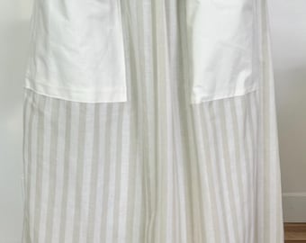 Pioneer, trek, theatre, plays, colonial, prairie, historical events, reenactments. Tan solid  skirt with tan striped  apron set.