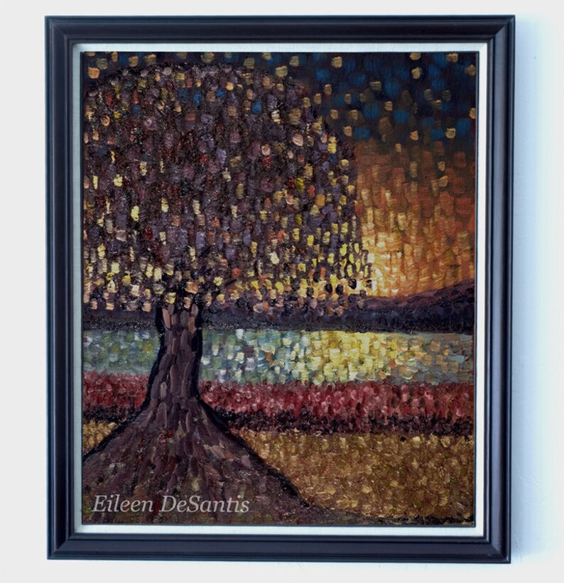 May include: A painting of a tree with a brown trunk and a dark purple and gold crown. The tree is in front of a body of water with a golden sunset in the background. The painting is signed "Eileen DeSantis" in the bottom right corner.