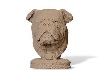 May include: A brown cardboard sculpture of a bulldog's head. The sculpture is detailed and has a layered effect.