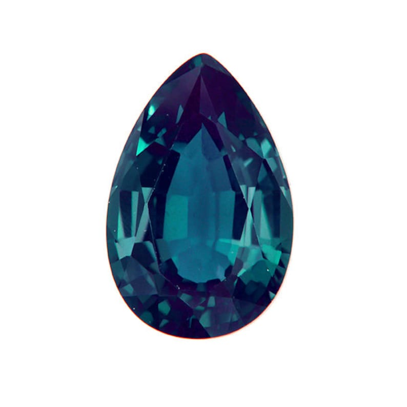 May include: A pear-shaped gemstone with a deep blue-green color. The gemstone has a faceted cut and a high level of brilliance.