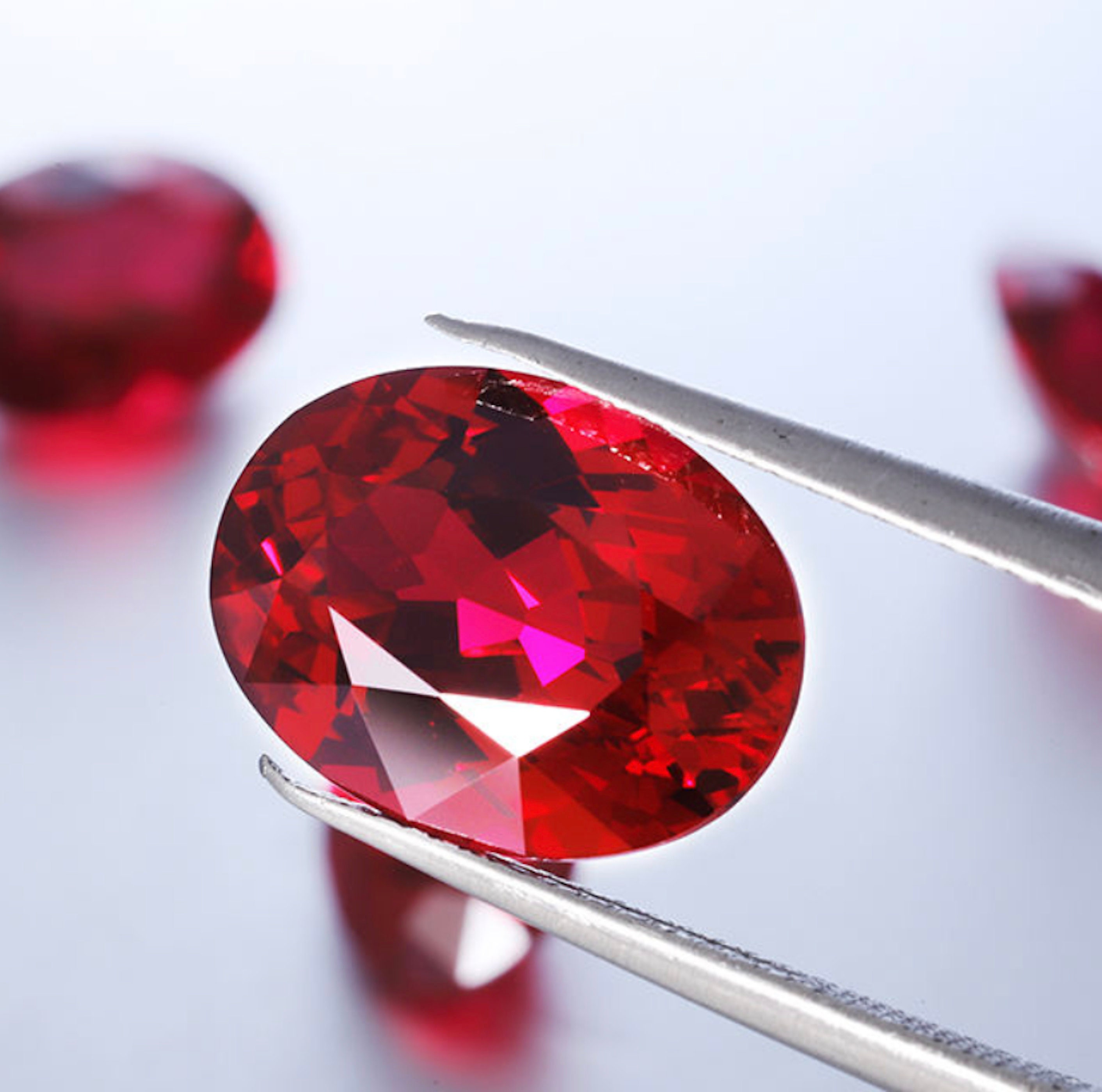 Lab Created Pulled Czochralski Ruby AAAAA Oval Faceted Loose