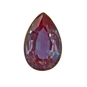 May include: A pear-shaped gemstone with a deep red hue and a purple iridescent sheen.