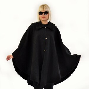 Ladies black 2025 cape jacket