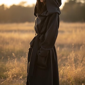 Black Wool Oversized Coat, Long Hooded Belted Outerwear with Sculptural Pockets