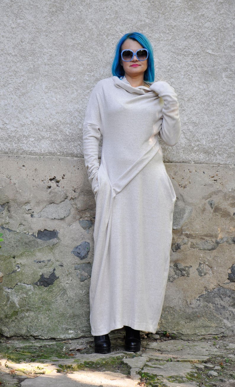 Long white dress with long sleeves made from cashmere. Kaftan style with cowl neck, perfect for winter.