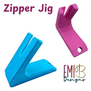 May include: Two plastic zipper jigs, one blue and one pink, are displayed against a white background. The blue jig is angled, while the pink one is upright. The text "Zipper Jig" is at the top, and the logo "EMIB Designs" is at the bottom.