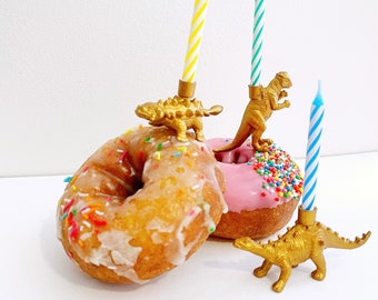 Gouden dinosauruskaars taarttopper: feestdecoratie dierentuindieren