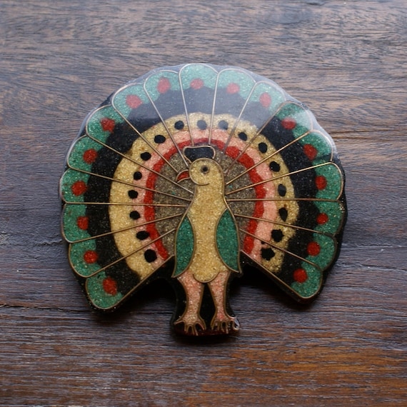 Peacock brooch
