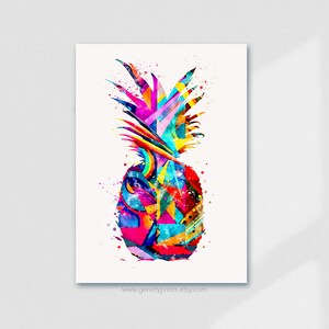 May include: A watercolour print of a pineapple, featuring a vibrant mix of colours. The artwork uses geometric shapes in pink, blue, yellow, and green. The pineapple's crown is a mix of pink, orange, and yellow.